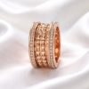 Anillo Acero bordes circonitas rosado
