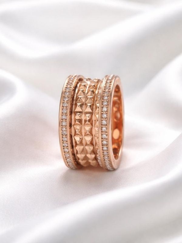 Anillo Acero bordes circonitas rosado
