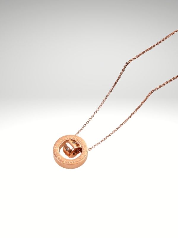 Colgante de acero 316L diseño italiano modelo doble medalla Oro rosa.