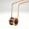 Colgante de acero 316L diseño italiano modelo cilindro negro color oro