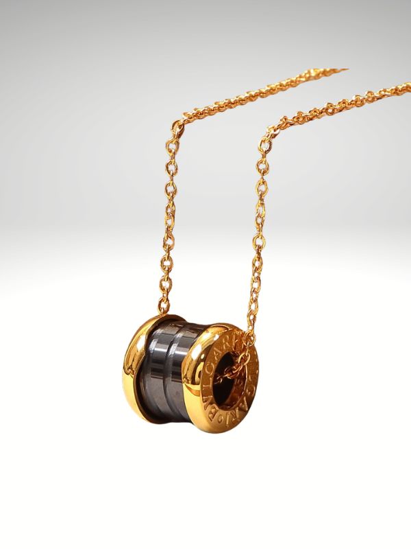 Colgante de acero 316L diseño italiano modelo cilindro negro color oro