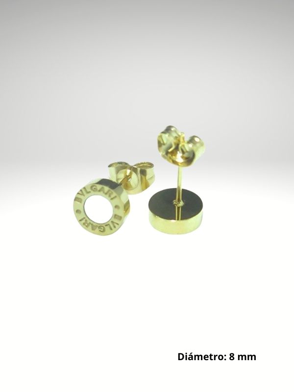 Pendiente de acero 8 mm diseño italiano color dorado con piedra blanca.