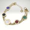 Pulsera triple cadena en acero inoxidable dorado diseño italiano.