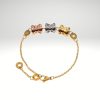 Pulsera tres cilindros en acero inoxidable dorado diseño italiano.