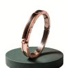 Pulsera rígida articulada en acero inoxidable oro rosa canto plateado diseño italiano.