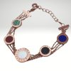 Pulsera triple cadena en acero inoxidable oro rosa diseño italiano.
