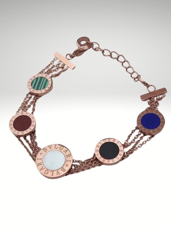 Pulsera triple cadena en acero inoxidable oro rosa diseño italiano.