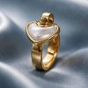 Anillo Acero dorado corazón.