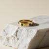 Anillo Acero dorado circonitas en verde y azul.