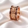 Anillo Acero inoxidable bordes negros rosado