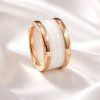 Anillo Acero rosado cerámica blanca.