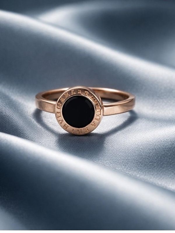 Anillo Acero rosado piedra negra