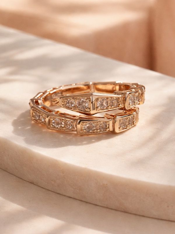 Anillo Acero rosado serpiente.