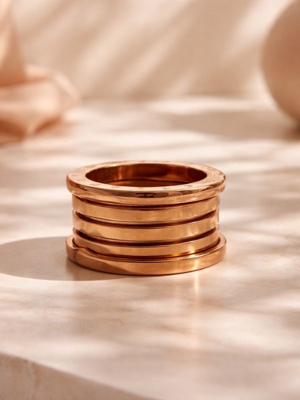 Anillo Acero rosado tres bandas
