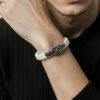 • Modelo con pulsera cuero trenzado blanco cierre acero 316L