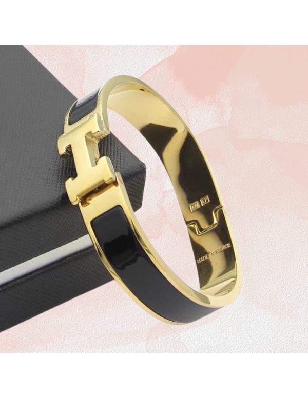 Brazaletes articulados Hermes nácar negro