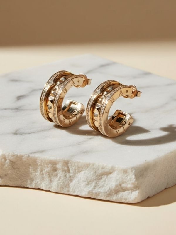 Pendientes aro abiertos acero 316L oro rosa diseño italiano