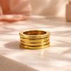 Anillo Unisex Acero 316L Tres Bandas Creativo 4 Anillo Acero dorado tres bandas.