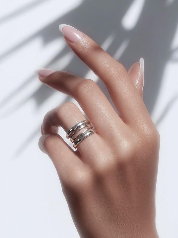 Anillo Acero 316L Entrelazado Pulido Impecable hover